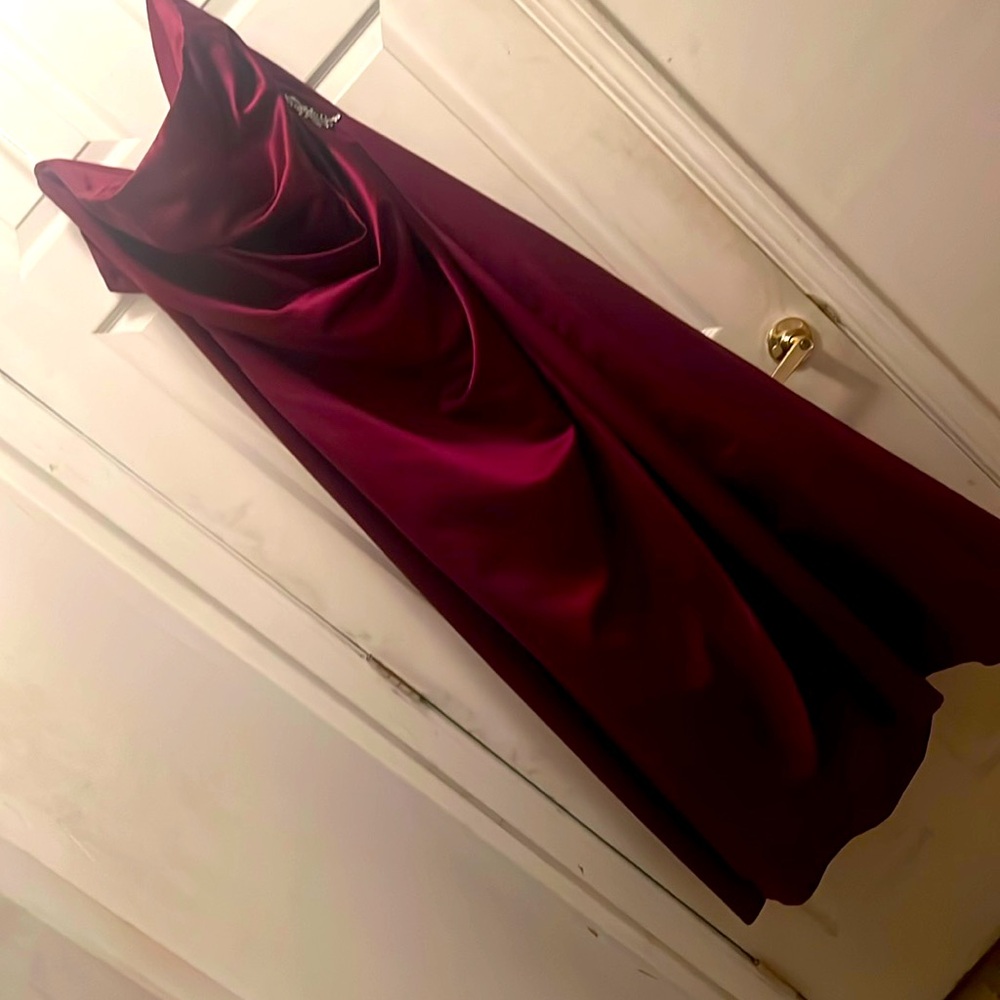 Beautiful burgundy strapless evening gown. Only worn once! Pristine condition!